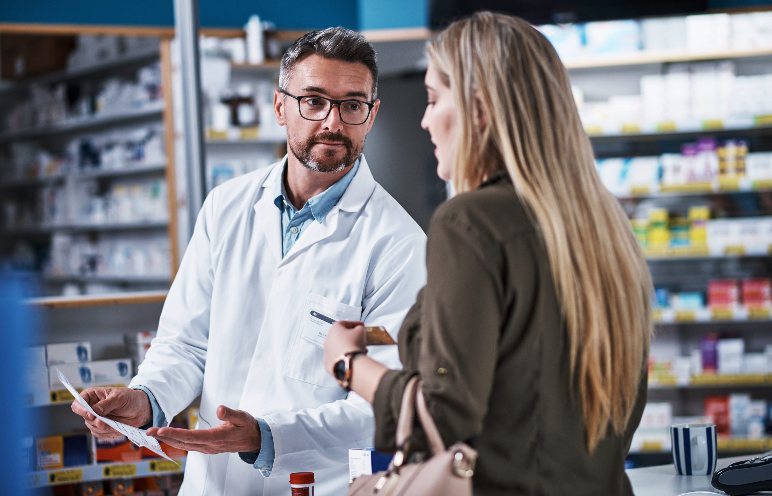 MediServ Pharmacy team reviewing medical supply needs with a patient